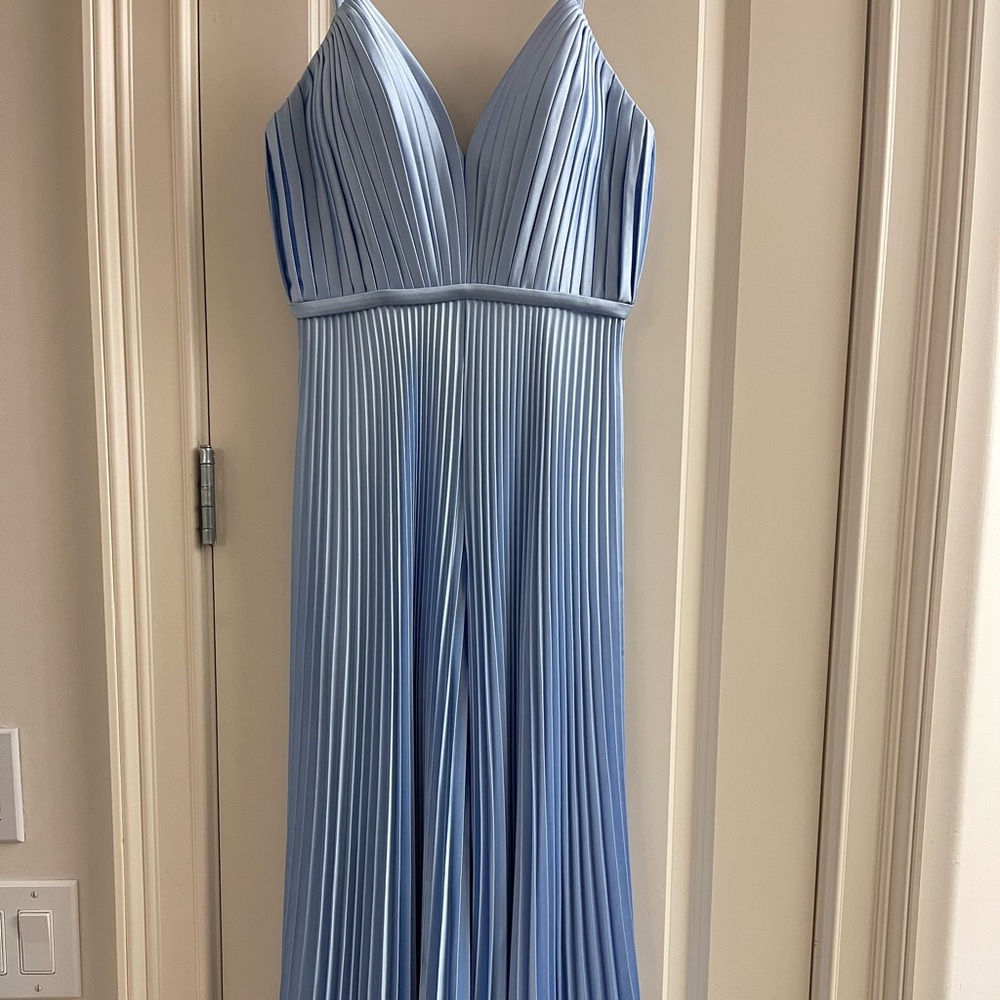 Elegant Light Blue Pleated wide leg jumpsuit.